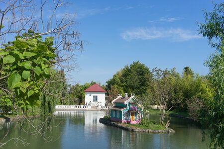 Sochi, Russia-June 24, 2018: a beautiful pond with birds and fish and a house for birdsのeditorial素材