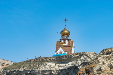 Crimean landmark: Cape Tarkhankut with beautiful rocks on the background of the sea and sky.の写真素材