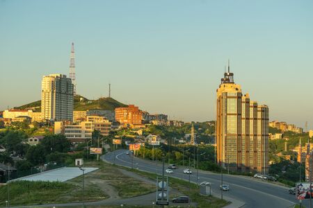 Vladivostok, Russia-July 29, 2018: Urban landscape of the modern city at sunset from a height.のeditorial素材