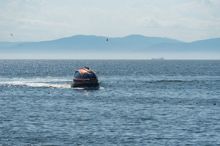 Vladivostok, Russia-July 28, 2018: Seascape with an unusual boat on the surface.