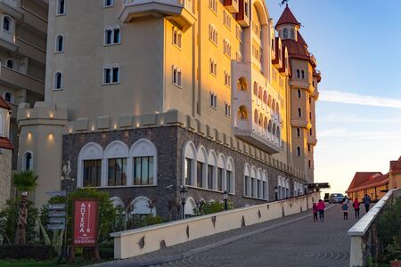 Sochi, Russia-January, 2018: popular hotel Bogatyr in the evening at sunset.のeditorial素材