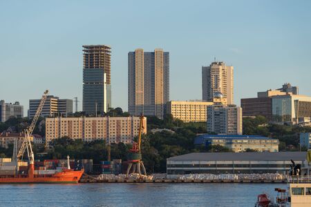 Vladivostok, Russia-August 11, 2018: Seascape overlooking the city and the boat with people.のeditorial素材