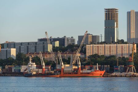 Vladivostok, Russia-August 11, 2018: Seascape overlooking the city and the boat with people.のeditorial素材