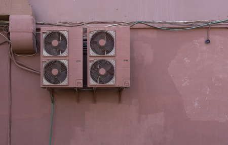 City background with painted wall and air conditioning. For design and networking.の写真素材