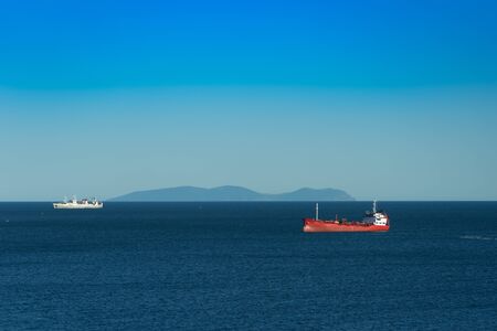 Seascape with ships on the background of the sea.のeditorial素材