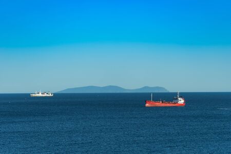 Seascape with ships on the background of the sea.のeditorial素材