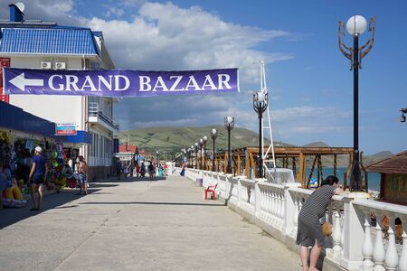 The waterfront of a small resort town on a warm summer day.のeditorial素材
