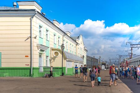 Ulan-Ude, Russia - July 17, 2018: Railway station of the city with the road, trains and people.のeditorial素材
