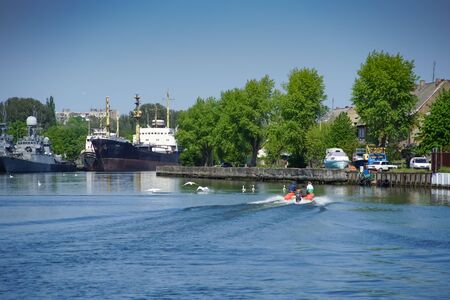 Baltiysk, Russia - may 19, 2016: Urban landscape with a seaport and ships at the pier.のeditorial素材