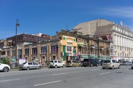 Vladivostok, Russia-August 17, 2018: Urban landscape with beautiful old buildings and cars under the blue sky.のeditorial素材