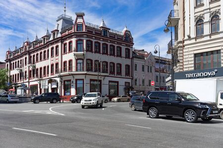 Vladivostok, Russia-August 17, 2018: Urban landscape with beautiful old buildings and cars under the blue sky.のeditorial素材