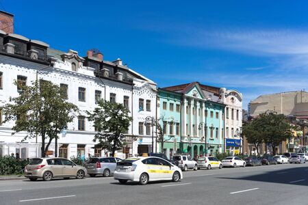 Vladivostok, Russia-August 17, 2018: Urban landscape with beautiful old buildings and cars under the blue sky.のeditorial素材