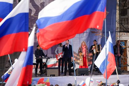 Sevastopol, Crimea-March 18, 2015: Russian Patriotic holiday with flags and concerts in the city square.のeditorial素材
