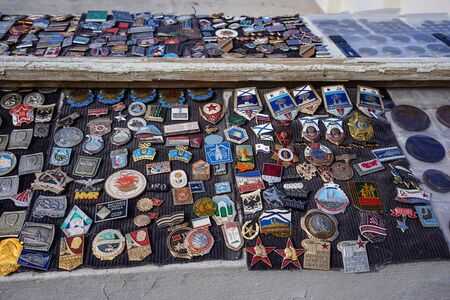 Sevastopol, Crimea-March 16, 2018: Street sale of the collection of icons and statues of different types.のeditorial素材