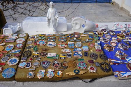 Sevastopol, Crimea-March 16, 2018: Street sale of the collection of icons and statues of different types.のeditorial素材