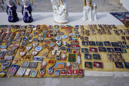 Sevastopol, Crimea-March 16, 2018: Street sale of the collection of icons and statues of different types.のeditorial素材