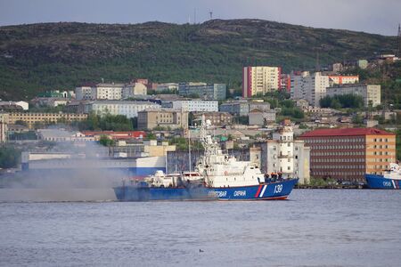 Murmansk, Russia-June 5, 2015: Seascape in the Kola Strait overlooking the ships and the city.のeditorial素材