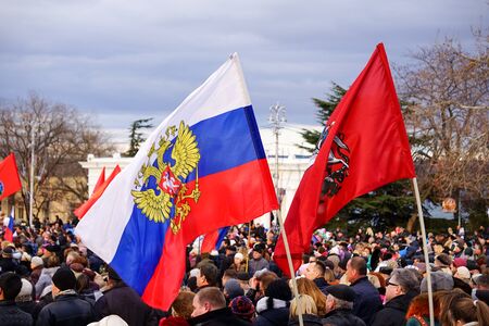 Sevastopol, Crimea-March 18, 2015: Russian Patriotic holiday with flags and concerts in the city square.のeditorial素材