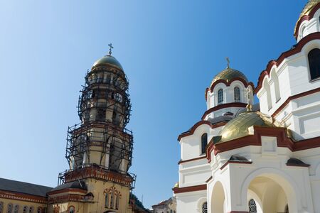 New Athos, Abkhazia-July 29, 2014: The architecture of the ancient monastery against the blue sky.のeditorial素材