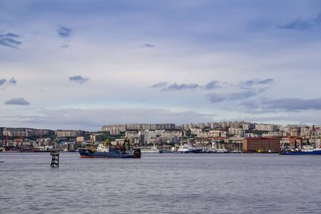 Murmansk, Russia-June 5, 2015: Seascape in the Kola Strait overlooking the ships and the city.のeditorial素材