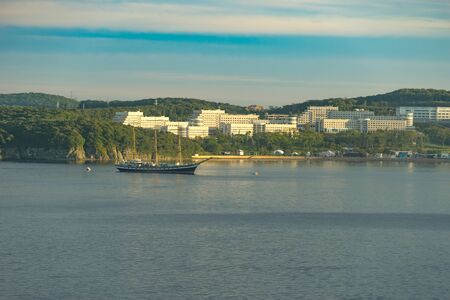 Vladivostok, Russia-September 16, 2018: seascape in the area of the Russian island with views of the Pallas sailboat and the campus.のeditorial素材