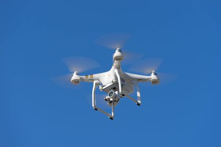 Sochi, Russia-may 20, 2018: White quadcopter on blue sky backgroundのeditorial素材
