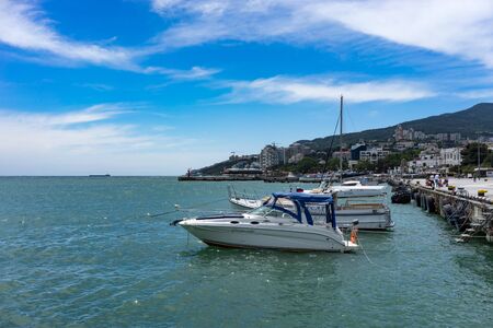 Yalta, Crimea-may 30, 2018: seascape with a boat on the background of the sea.のeditorial素材