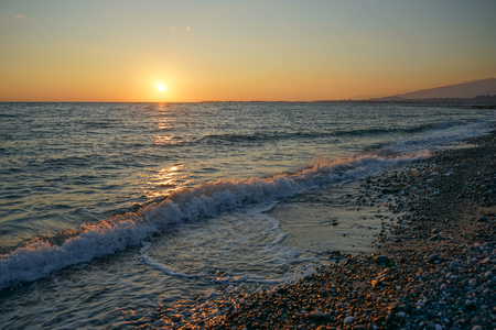 seascape with a magnificent sunset over the sea.の写真素材