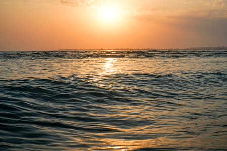 seascape with a magnificent sunset over the sea.の写真素材