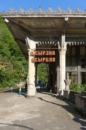 New Athos, Abkhazia-April 29, 2018: Destroyed station Psyrtskha with peopleのeditorial素材