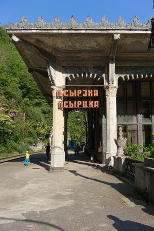 New Athos, Abkhazia-April 29, 2018: Destroyed station "Psyrtskha" with people.のeditorial素材