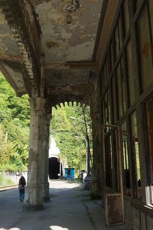 New Athos, Abkhazia-April 29, 2018: Destroyed station "Psyrtskha" with people.のeditorial素材