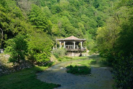 New Athos, Abkhazia-April 29, 2018: Landscape with a ruined and abandoned train station.のeditorial素材