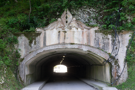 New Athos, Abkhazia-April 29, 2018: Tunnel under the mountain with a beautiful carved arch.の写真素材