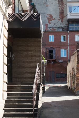 Vladivostok, Russia-July 28, 2018: Urban landscape with views of the old street and stairs.のeditorial素材