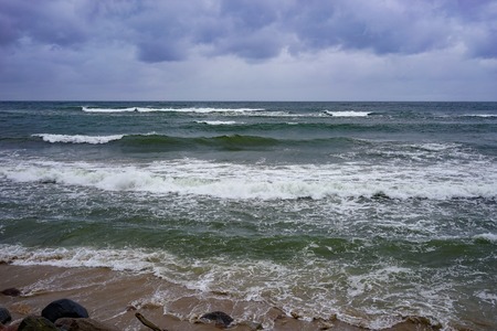Seascape in cloudy rainy weather.の写真素材