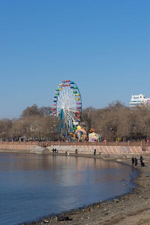 Vladivostok, Russia-December 1, 2018: Urban landscape with a public Park on the ocean.のeditorial素材