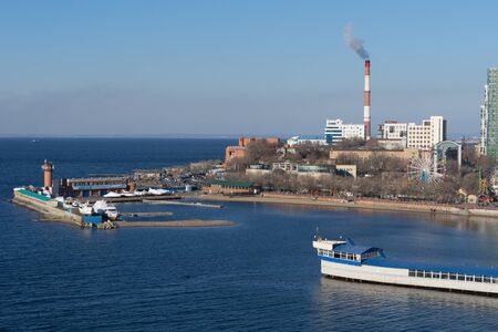 Vladivostok, Russia-December 1, 2018: Seascape with boat Parking on the background of the blue sea.のeditorial素材