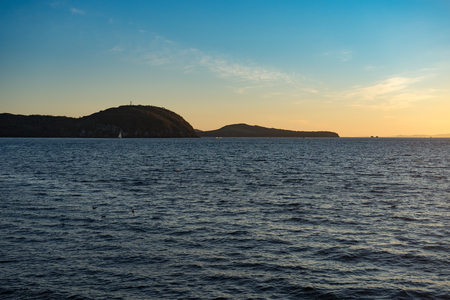 Seascape with beautiful sunset and sunset on the horizon.の写真素材