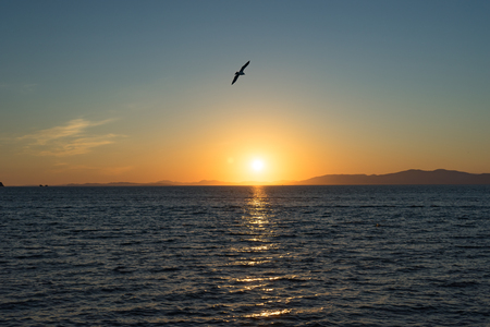 Seascape with beautiful sunset and sunset on the horizon.の写真素材
