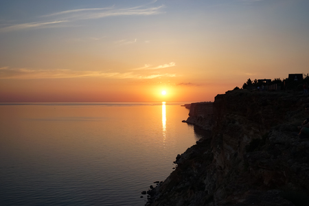 Amazing sunset over the sea and coastline.の写真素材