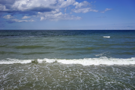 Sea landscape with the Baltic sea and a sky with clouds.の写真素材