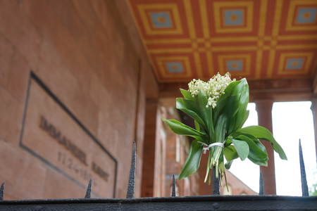 Kaliningrad, Russia-may 18, 2016: Bouquet of lilies of the valley on the metal fence of Kant'sの写真素材