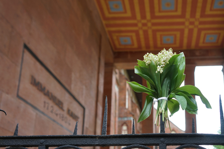 Kaliningrad, Russia-may 18, 2016: Bouquet of lilies of the valley on the metal fence of Kant'sの写真素材