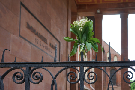 Kaliningrad, Russia-may 18, 2016: Bouquet of lilies of the valley on the metal fence of Kant'sの写真素材