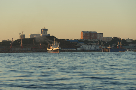 Vladivostok, Russia-September 16, 2018: Seascape with ships on the background of the city.の写真素材