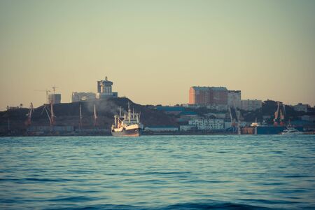 Vladivostok, Russia-September 16, 2018: Seascape with ships on the background of the city.のeditorial素材