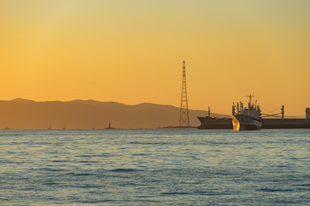 Vladivostok, Russia-September 16, 2018: Seascape with ships at sunset.の写真素材