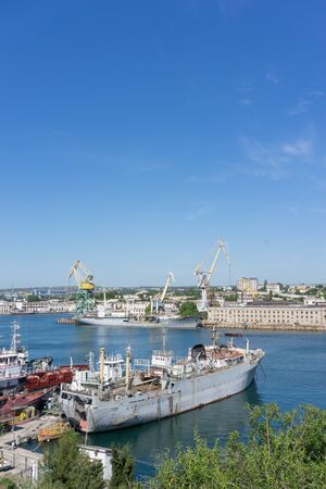 Sevastopol, Crimea-may 31, 2018: Urban landscape with views of ships and buildings in the open air.のeditorial素材