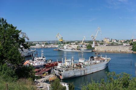 Sevastopol, Crimea-may 31, 2018: Urban landscape with views of ships and buildings in the open air.のeditorial素材